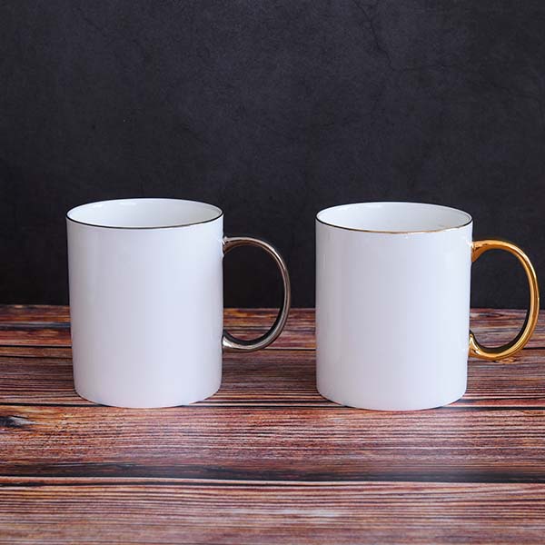 A Pair of Bone China Mug with Golden and Silver Handle