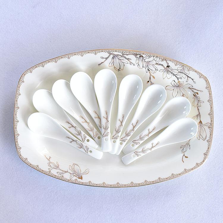 Magnolia 50-piece Porcelain Dinnerware